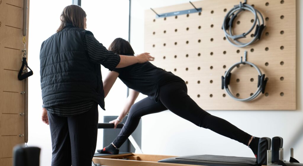 Cath teaching Reformer Pilates NZ