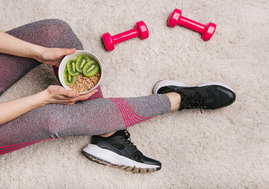 Woman working out and eating healthy